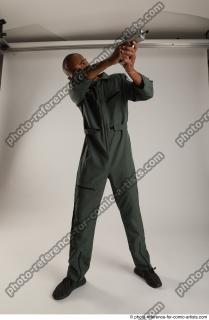 ERIC IN ACTION WITH GUN